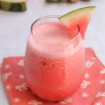 glass filled with watermelon revitalizer beverage