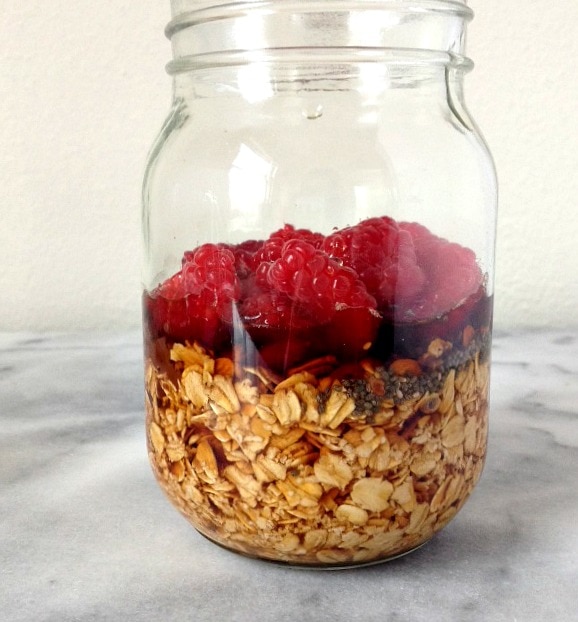 mocha raspberry overnight oats in a Mason jar | The Nutrition Adventure