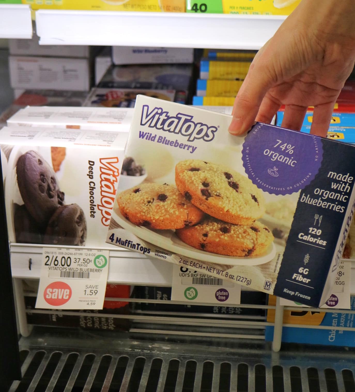 Boxes of VitaTops wild blueberry and deep chocolate flavored muffin tops