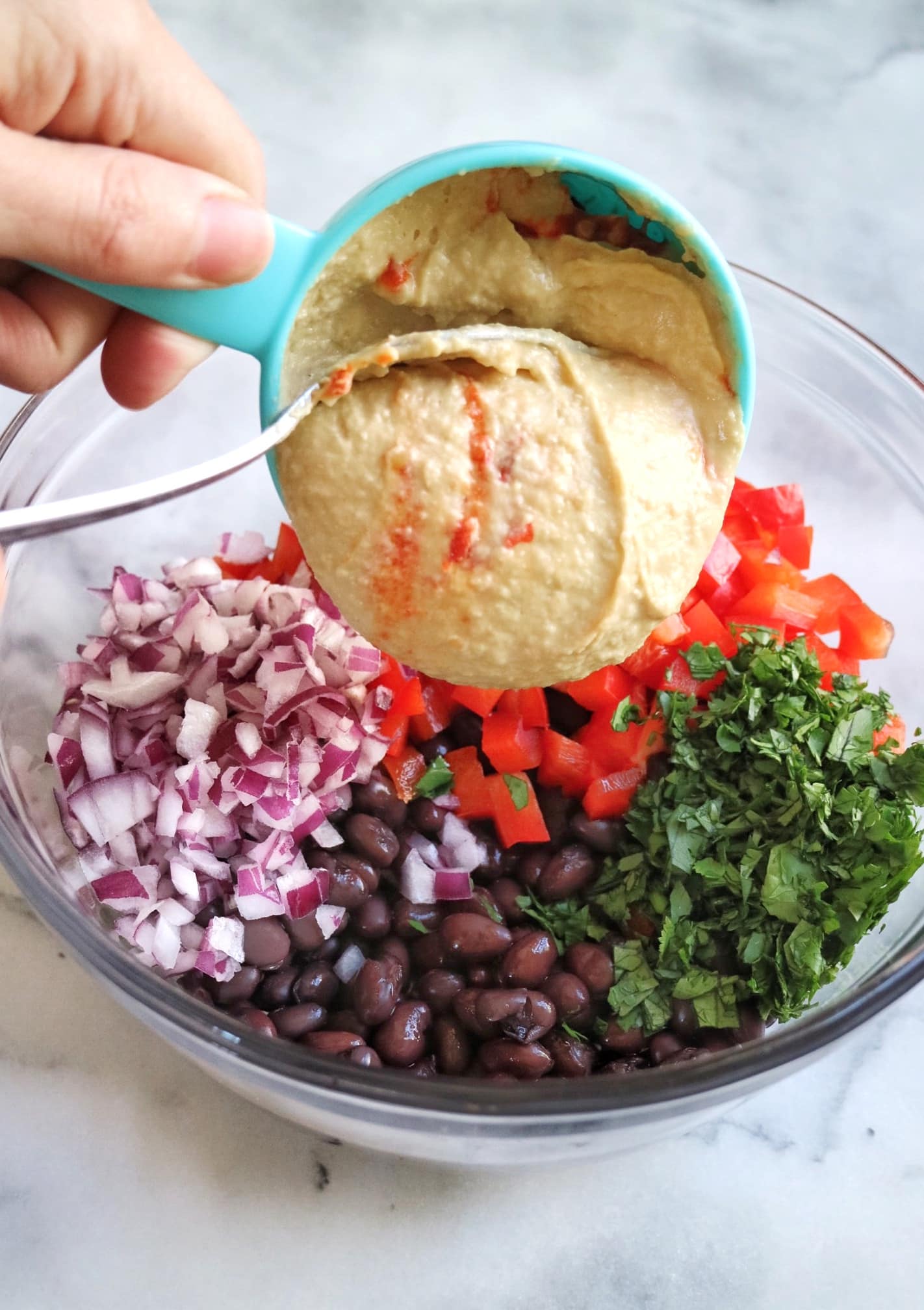 Mini Hummus Black Bean Burritos ingredients in a mixing bowl | The Nutrition Adventure