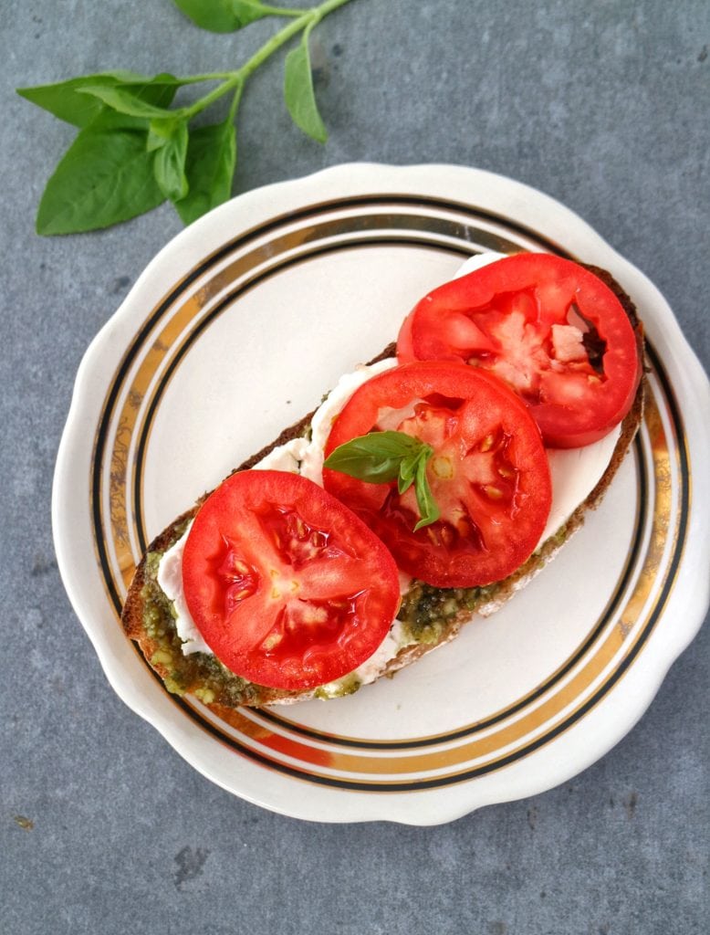 Basil Walnut Pesto on toast with tomatoes